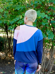 Kinetic Tee pdf sewing pattern - athlete model wearing a colourblock version of View C, back