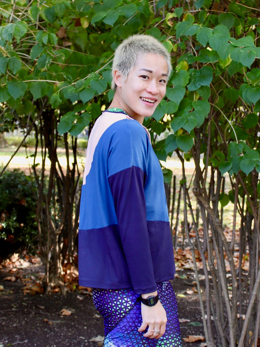 Kinetic Tee pdf sewing pattern - athlete model wearing a colourblock version of View C, side