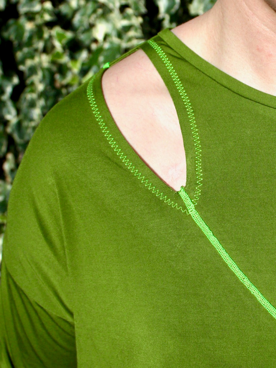 Kinetic Tee pdf sewing pattern - designer wearing View B with contrast stitching, front right opening 